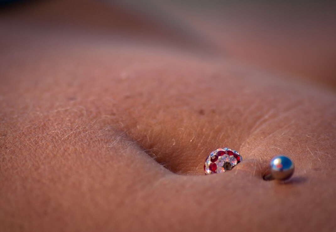 nipple piercings and breast implants img | Inigo Cosmetic